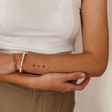 Tatuaje Pausa, Play, Siguiente