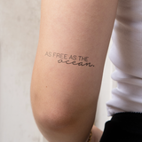 Tatuaje Frase "As free as the ocean"