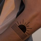 Tatuaje Amanecer geométrico