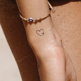 Tatuaje Corazón con Avión