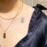 Tatuaje Búho Sentado