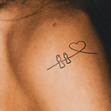 Tatuaje Golondrinas y Corazón