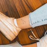Tatuaje Constelación Leo