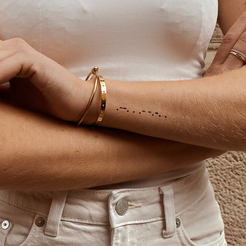 Tatuaje Paz en Código Morse