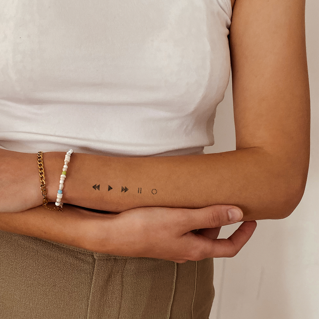 Pausa, Play, Siguiente | Tatuaje temporal | Inkster