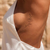 Tatuaje de rosa sutil